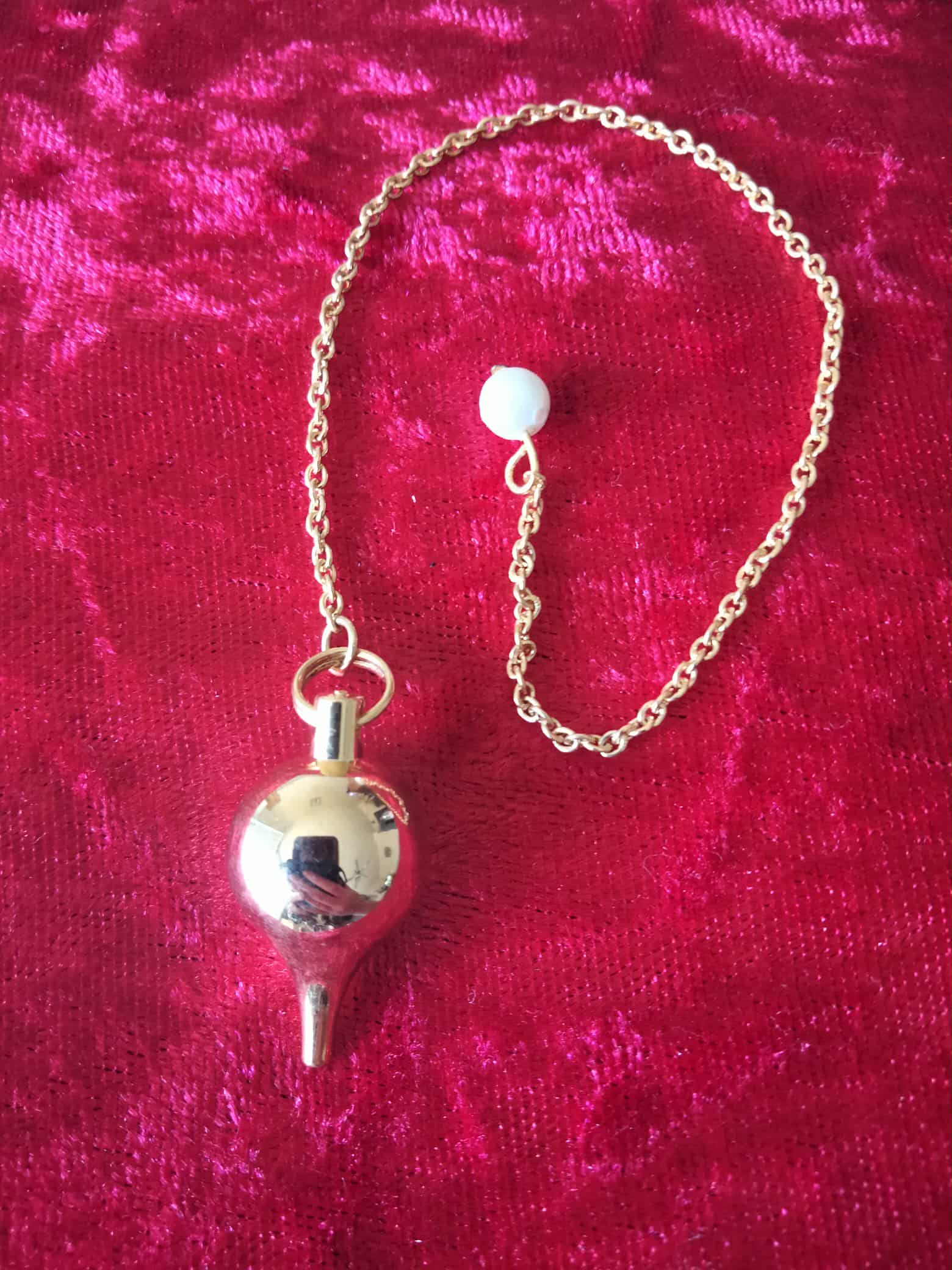 Pendule en laiton plaqué or